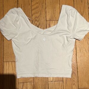 Cropped white Lululemon shirt size 6
